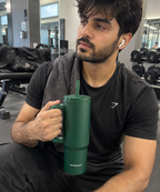 Man carrying WaterCraft Aura green tumbler at the gym - UGC